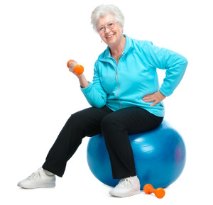 Senior woman working with weights in gym - Central City Physiotherapy